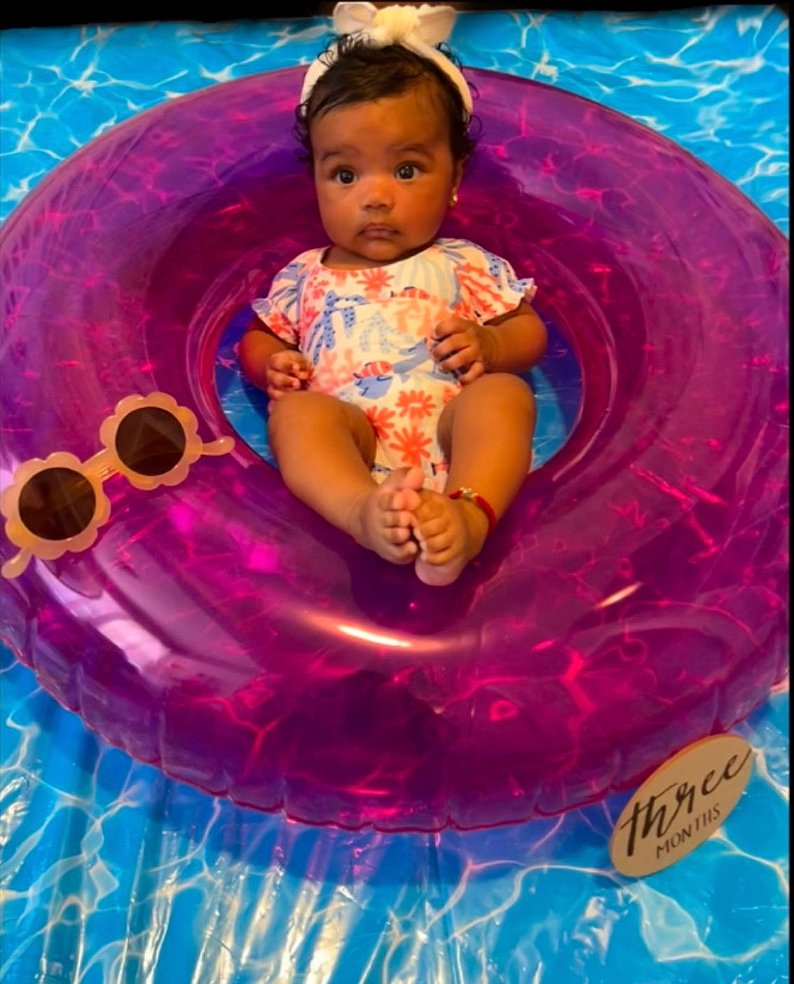 Elayna joined the competition — help win amazing prizes! baby, baby_toddler_clothing, child, circle, electric_blue, fun, happy, leisure, magenta, pattern, person, pink, play, product, purple, recreation, sitting, toddler, violet, water