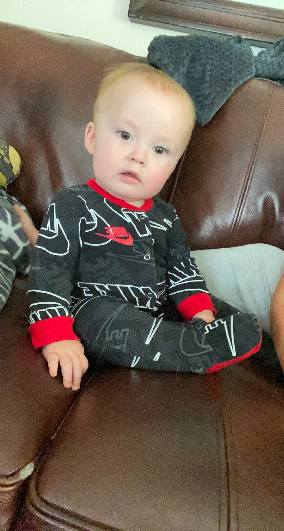 Joziah is registered to the contest to win money with this photo: baby, baby_toddler_clothing, cheek, child, chin, comfort, cool, eye, finger, flash_photography, hairstyle, head, human_body, iris, knee, leg, lip, person, skin, sleeve