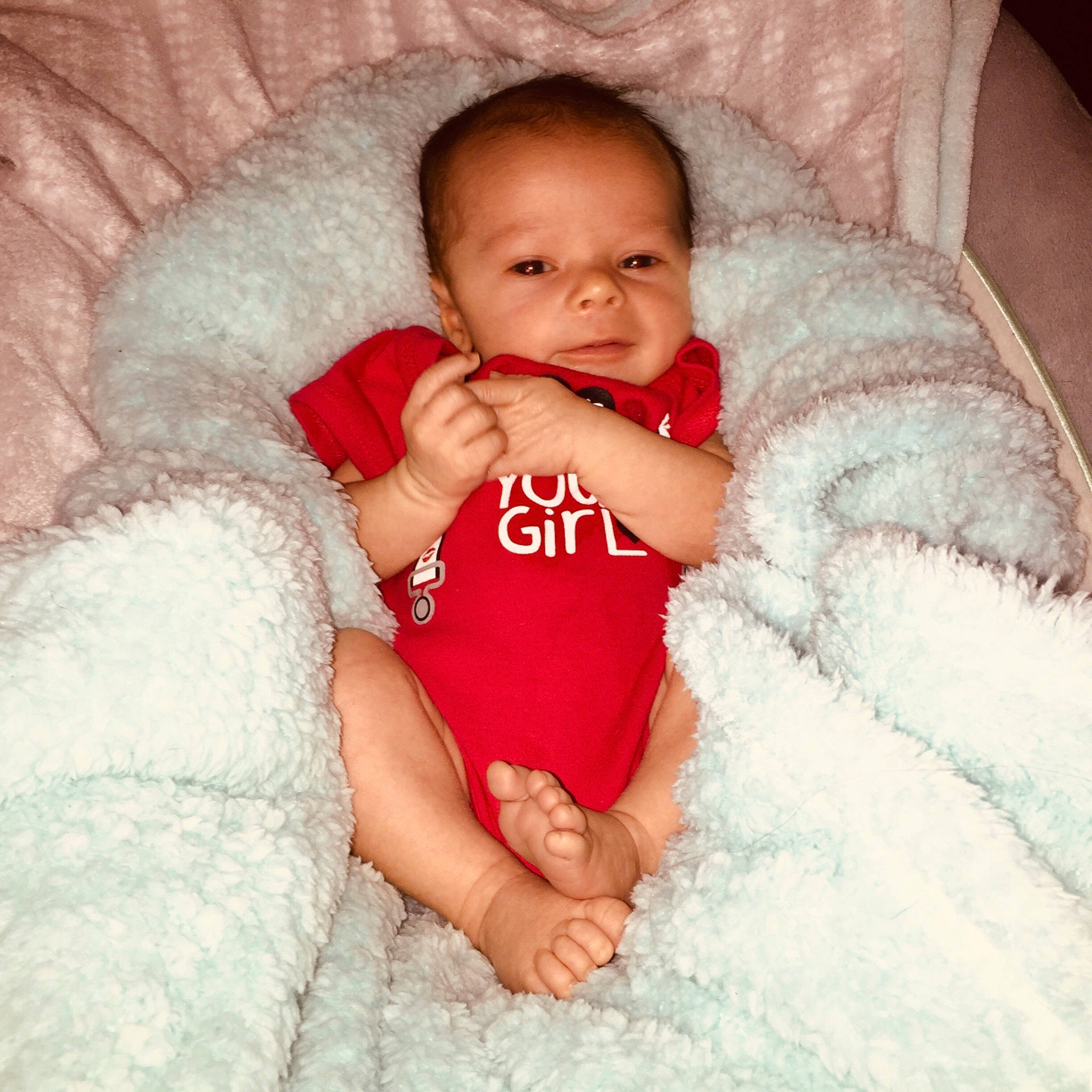 Elliott is registered to the contest to win money with this photo: baby, beauty, cheek, child, eye, face, finger, hand, happy, head, linens, lip, mouth, nose, person, pink, red, skin, smile, textile