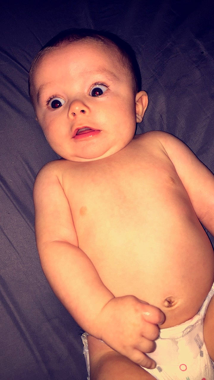 Elliott Jason Wade Foster is registered to the contest to win money with this photo: abdomen, arm, baby, cheek, child, chin, eye, face, head, human, lip, mouth, muscle, nose, organ, person, skin, standing, stomach, toddler