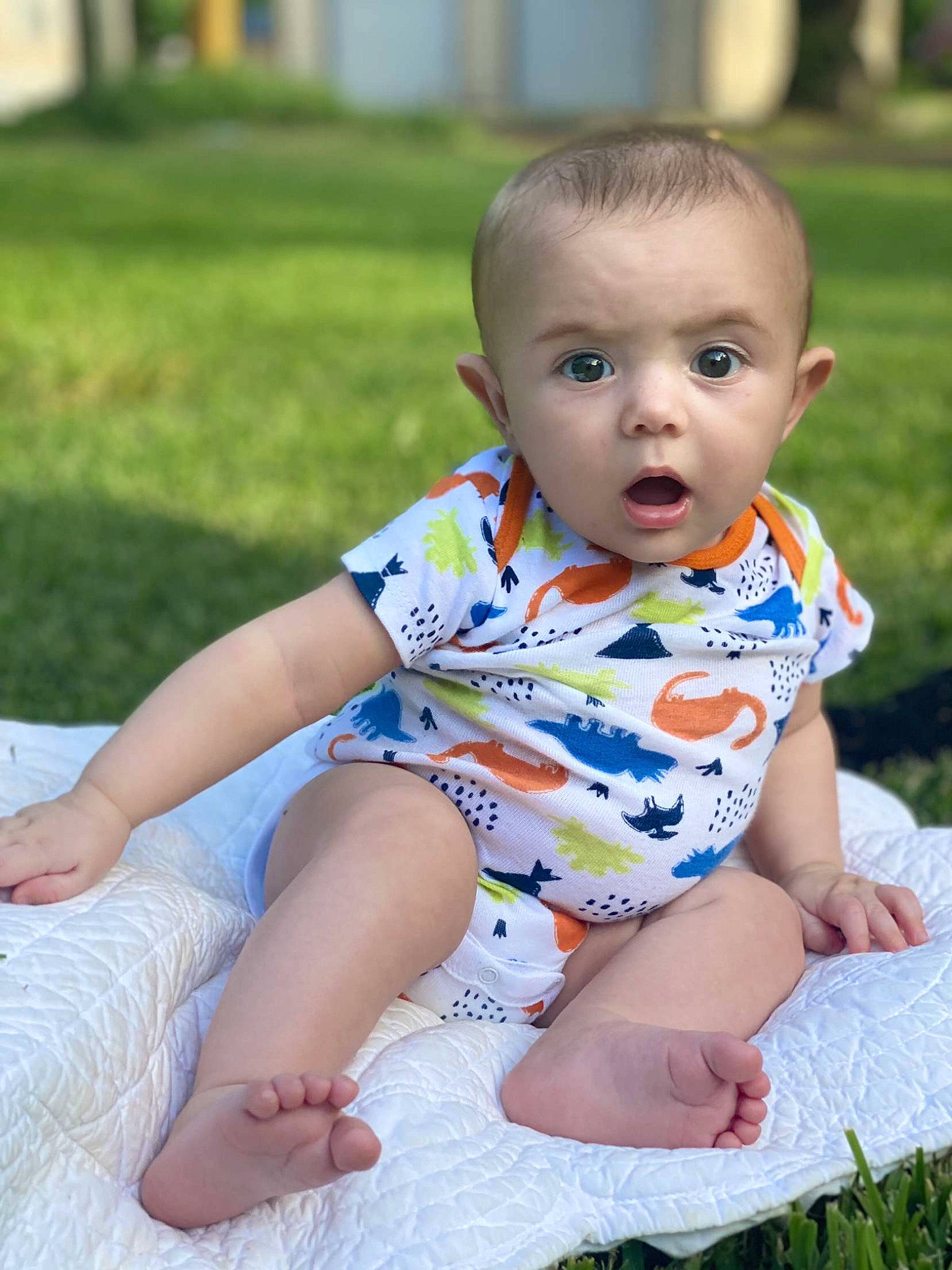 Caine joined the competition — help win amazing prizes! baby, baby_toddler_clothing, cheek, child, eye, facial_expression, flooring, fun, grass, happy, iris, leg, leisure, pattern, person, plant, skin, sleeve, surprise, t_shirt