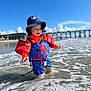 beach, child, fun, happy, hat, life_jacket, ocean, outdoor, pier, play, sky, spiderman, splashing, summer, sunny, swimwear, toddler, water, water_safety, waves