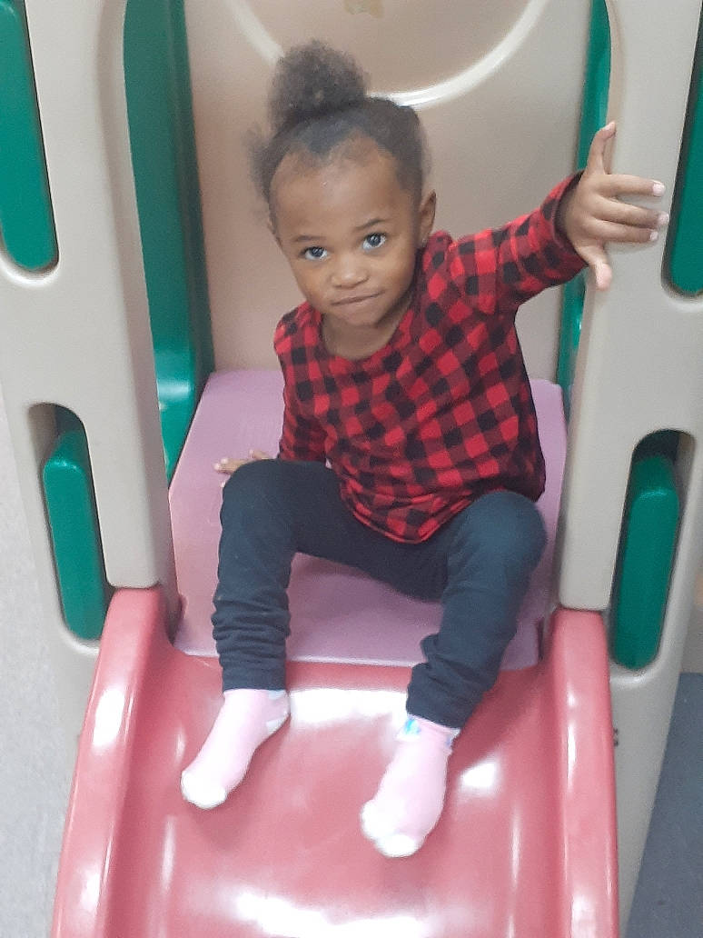 Lyric joined the competition — help win amazing prizes! baby, child, fun, outdoor_play_equipment, person, pink, play, playground, playground_slide, playset, sitting, smile, swing, toddler, toy