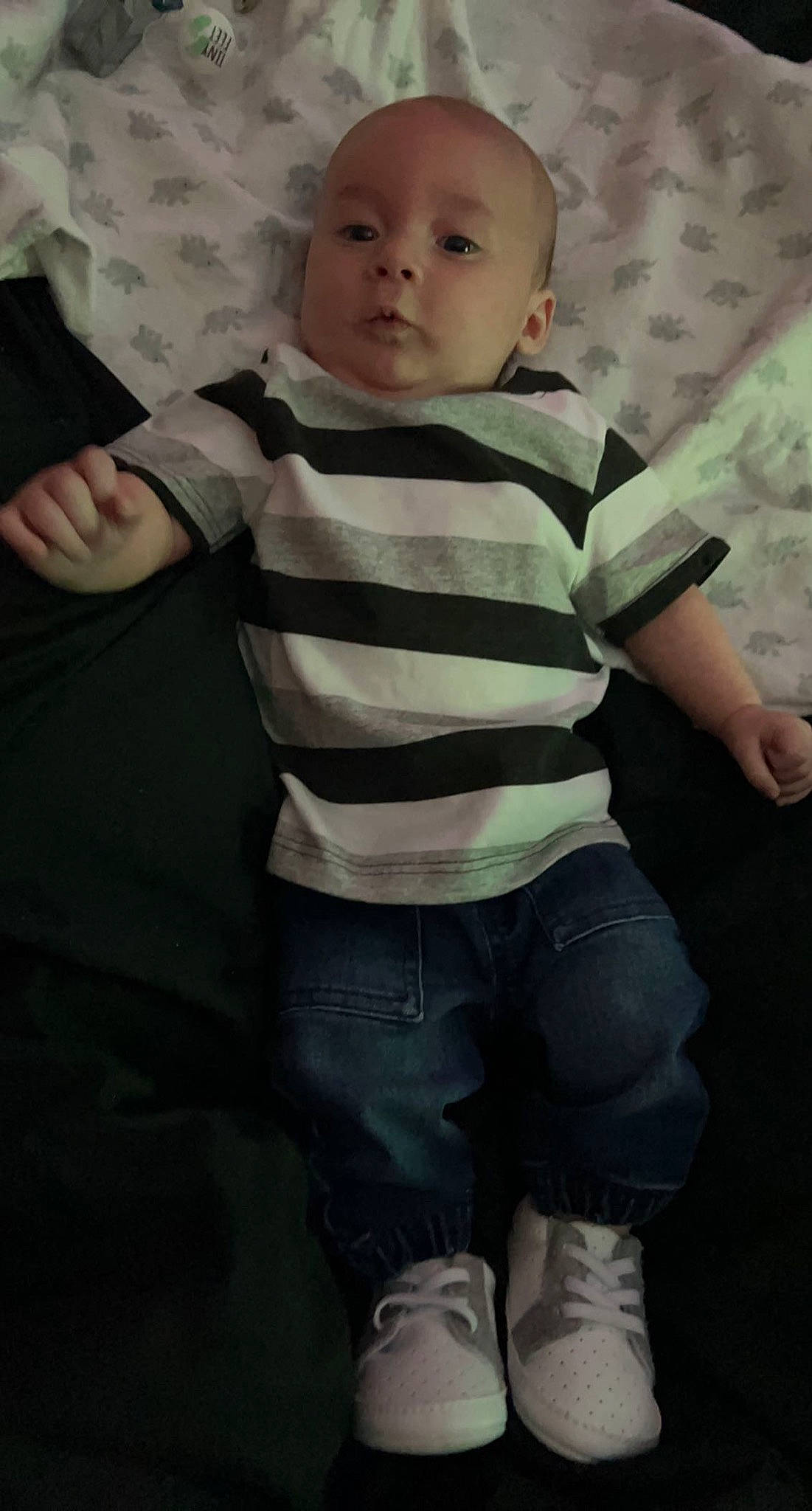 Aiden is registered to the contest to win money with this photo: baby, baby_toddler_clothing, cheek, child, chin, cool, gesture, grey, hairstyle, iris, mouth, neck, pattern, person, shoulder, skin, sleeve, t_shirt, tints_and_shades, toddler