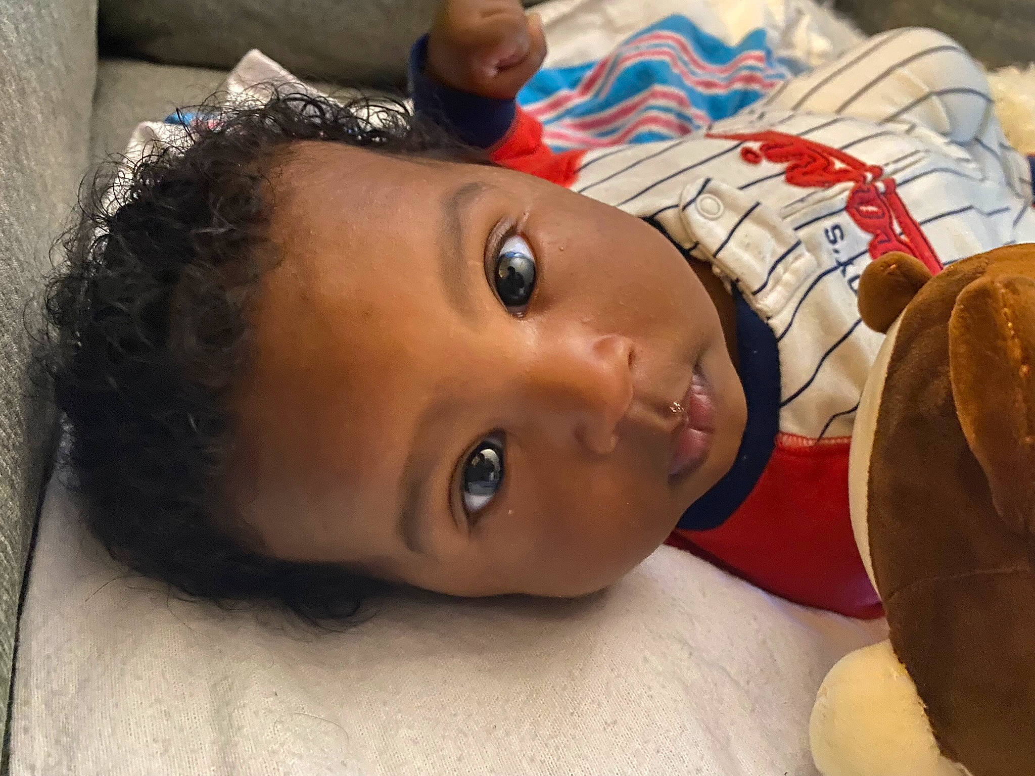 Carsyn is registered to the contest to win money with this photo: baby, cheek, child, close_up, comfort, eye, eyebrow, eyelash, fashion_accessory, flooring, forehead, fun, happy, headgear, lip, mouth, nose, person, skin, toddler