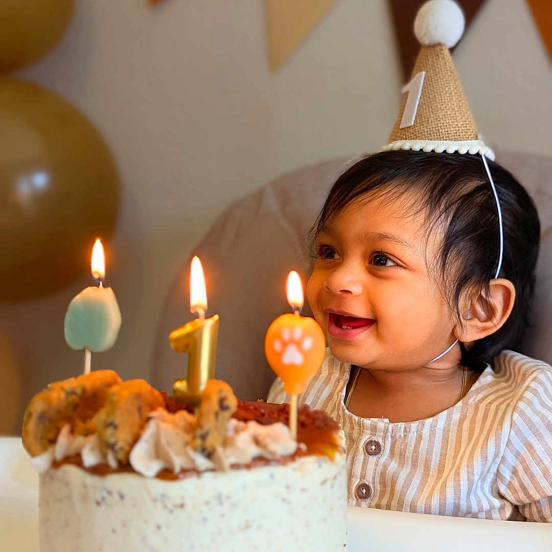 Rishi joined the competition — help win amazing prizes! baby, balloons, birthday, bunting, cake, candle, celebration, child, cookies, cream, decorations, first_birthday, food, happy, highchair, icing, indoor, party_hat, person, smile