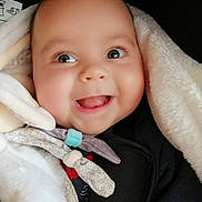 Néo participe au concours pour gagner de l'argent avec cette photo : baby, smile, blanket, face, infant, cute, expression, child, warm, soft, happy, wrapped, cozy, portrait, closeup, clothing, adorable, joyful, person, young
