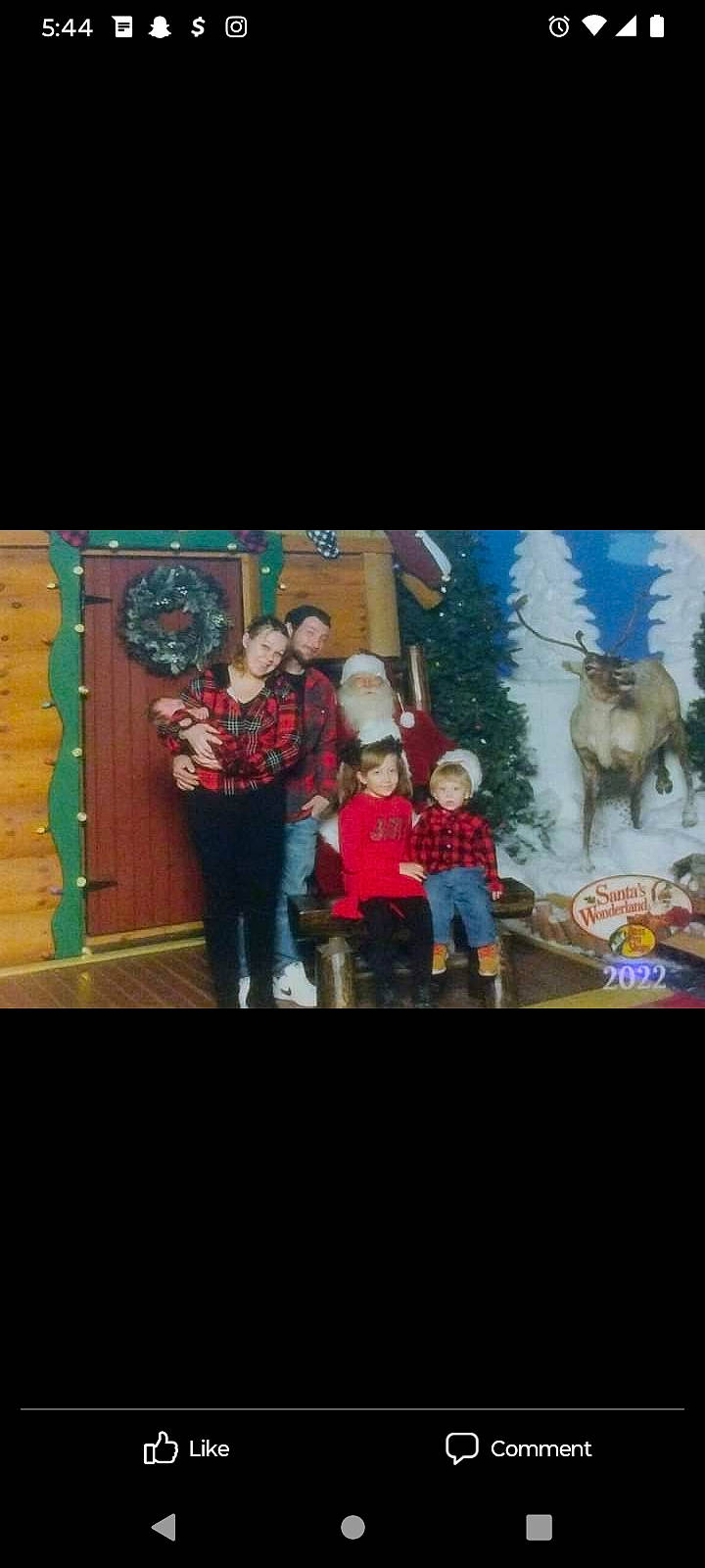 Kash is registered to the contest to win money with this photo: art, artist, christmas, christmas_decoration, display_device, entertainment, event, fictional_character, fun, happy, holiday, illustration, joy, leisure, mural, night, performance, performance_art, performing_arts, person