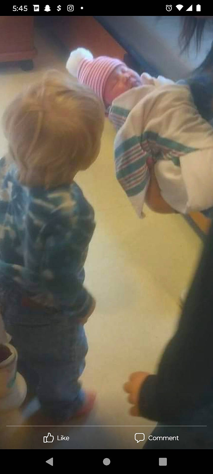 Lillian joined the competition — help win amazing prizes! baby, child, cup, drinkware, flooring, fun, person, play, pottery, room, serveware, sitting, sleeve, t_shirt, tableware, toddler, toy, tree, visual_arts, wood