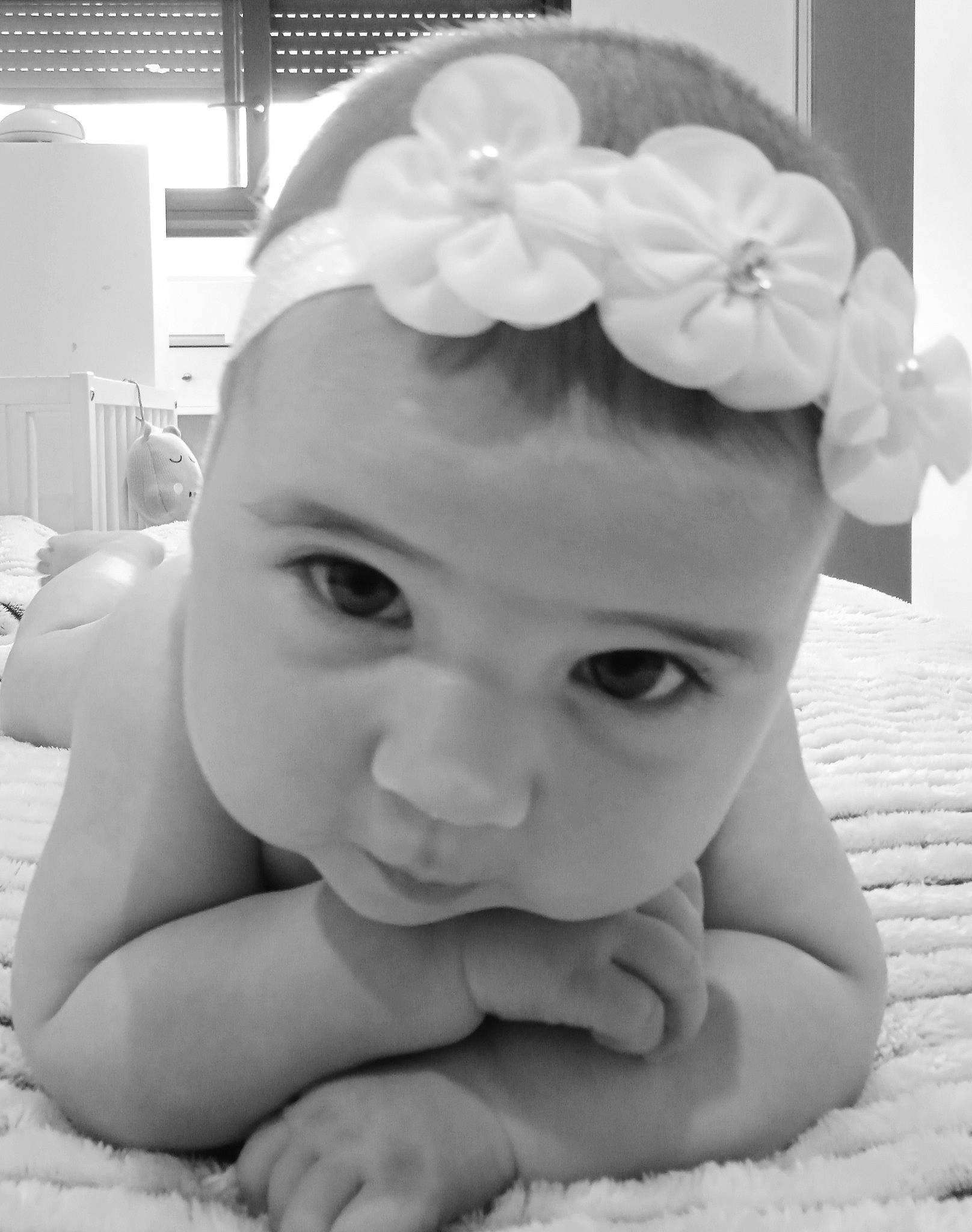Capucine participe au concours pour gagner de l'argent avec cette photo : baby, baby_toddler_clothing, cheek, child, chin, ear, eye, eyebrow, facial_expression, finger, gesture, hairstyle, happy, headpiece, nose, person, photograph, skin, smile, standing