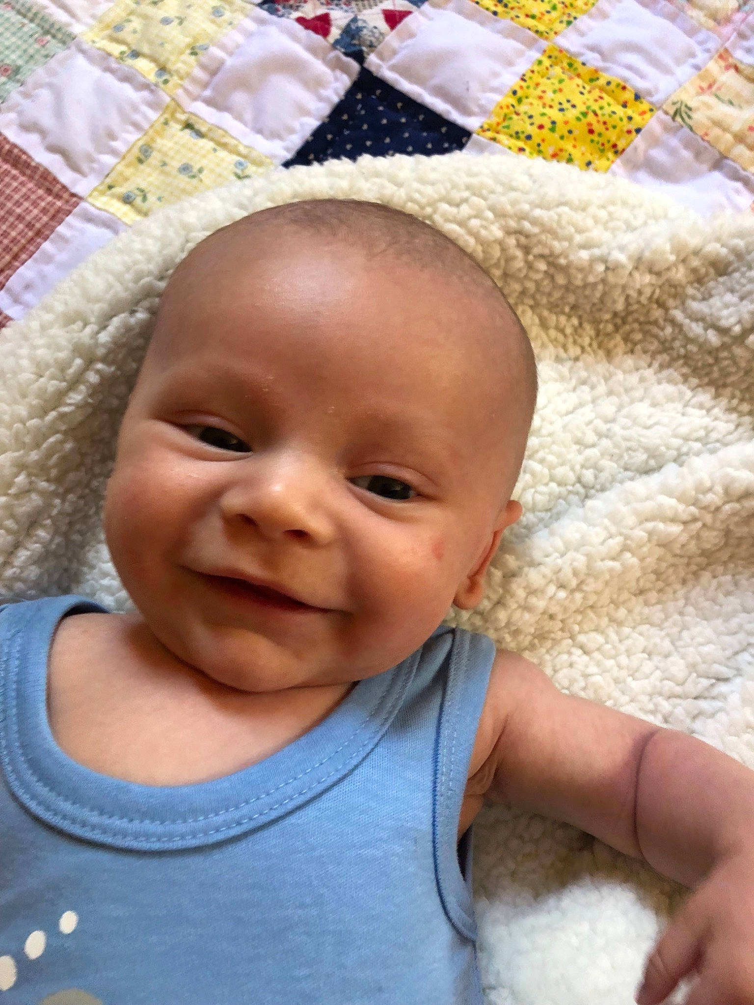 Kalvin is registered to the contest to win money with this photo: baby, cheek, child, face, head, lip, nose, person, skin, smile, toddler