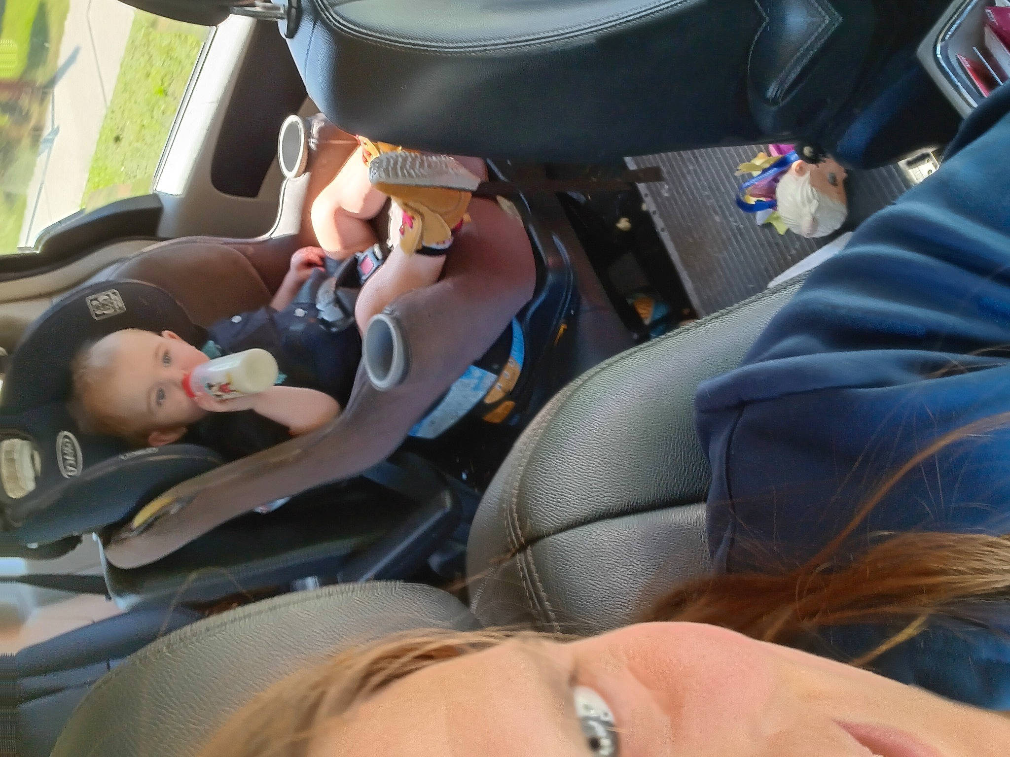 Sebastian is registered to the contest to win money with this photo: auto_part, automotive_design, car, car_seat, car_seat_cover, comfort, electric_blue, eyelash, family_car, gesture, head_restraint, luxury_vehicle, motor_vehicle, person, seat_belt, service, steering_part, steering_wheel, toddler, vehicle