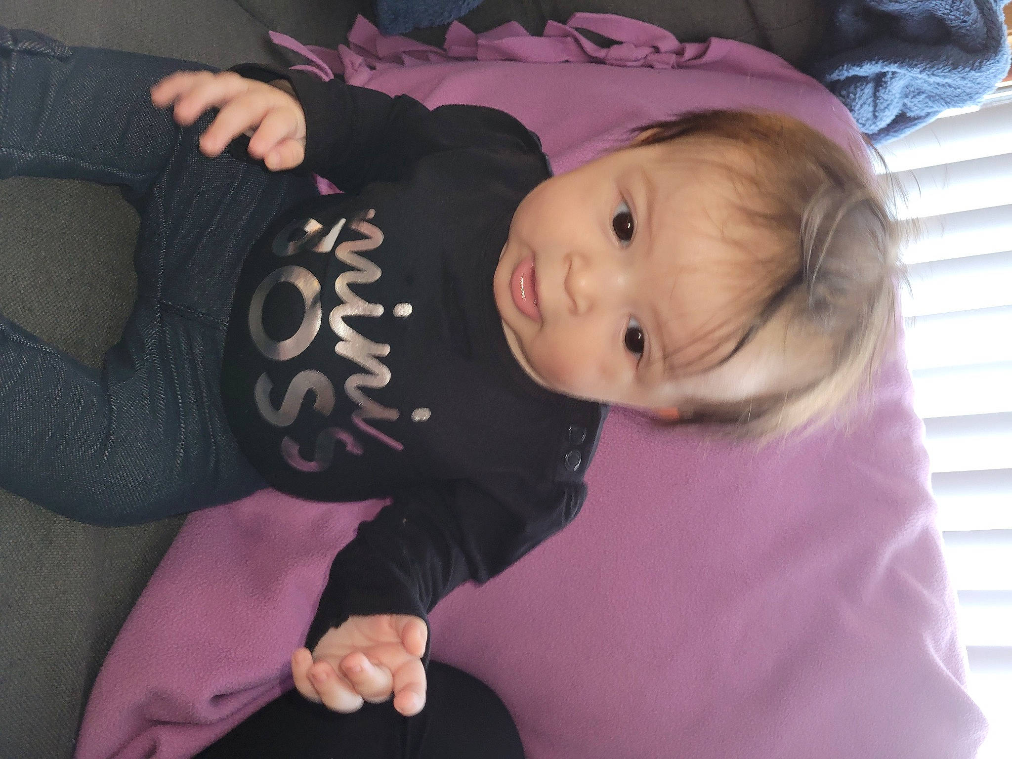 Emberly is registered to the contest to win money with this photo: baby, baby_products, baby_toddler_clothing, cheek, child, comfort, fun, hat, lap, magenta, person, pink, purple, sitting, sleeve, smile, toddler, tree, violet