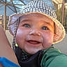 Jason joined the competition — help win amazing prizes! baby, child, face, smile, hat, sunhat, outdoor, sunscreen, cheeks, blue_eyes, happy, closeup, cute, infant, green_clothing, sunlight, shade, photography, portrait, skin