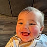 Jason joined the competition — help win amazing prizes! baby, infant, smiling, happy, face, closeup, child, cute, onesie, animal_print, cheeks, mouth, tongue, eyes, hair, skin, indoors, portrait, expression, joy