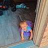 Renezmae joined the competition — help win amazing prizes! toddler, child, crawling, doorway, purple_tutu, blue_eyes, stroller, red_clothing, wooden_floor, indoor, outdoor, brick_wall, concrete_step, curious, baby, person, flooring, casual, playful, home_interior