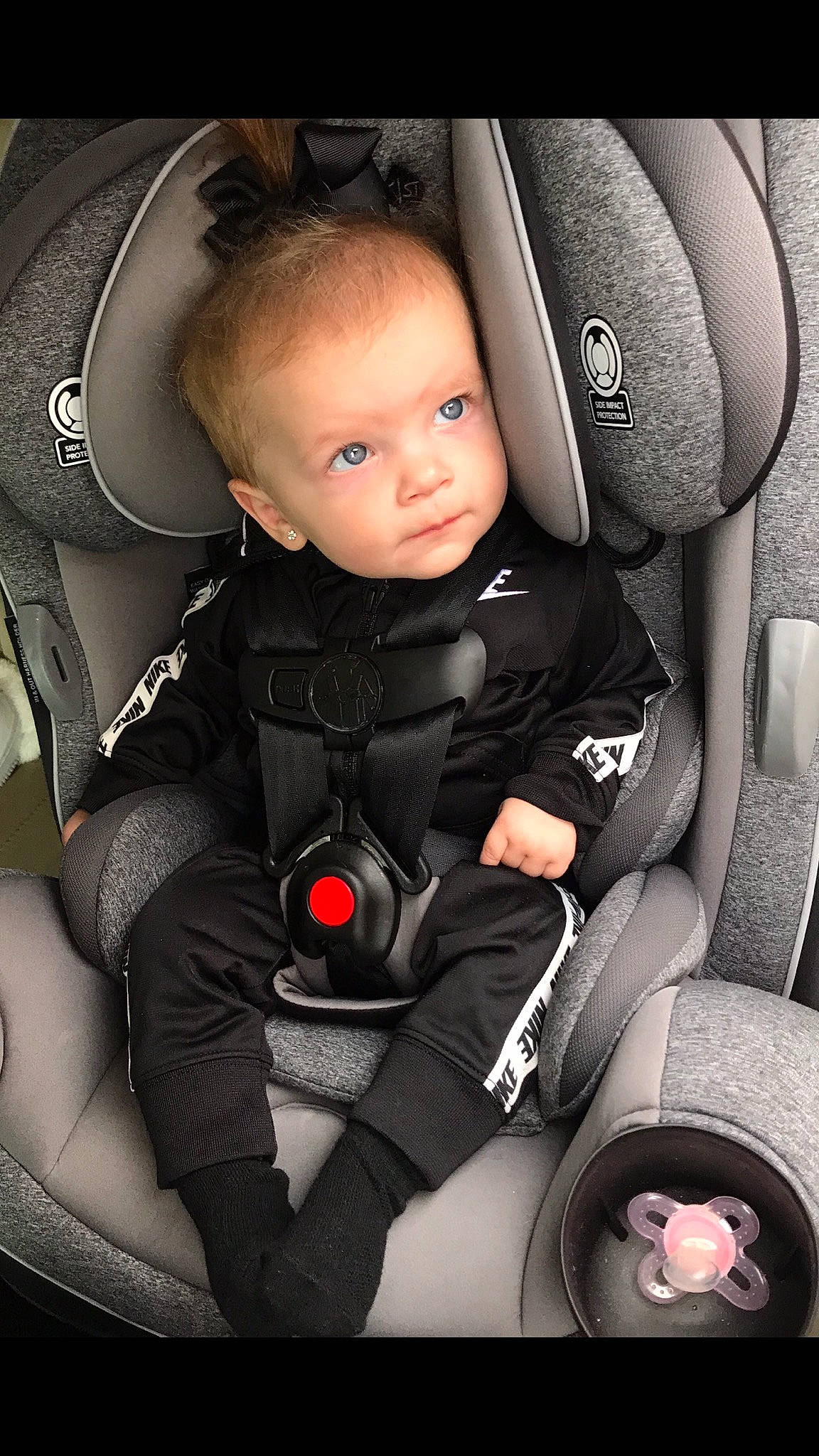 Kenzley is registered to the contest to win money with this photo: auto_part, baby, baby_carriage, baby_in_car_seat, baby_products, car_seat, car_seat_cover, child, comfort, person, product, seat_belt, toddler
