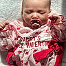 Melinna Mae joined the competition — help win amazing prizes! baby, pacifier, infant, sleeping, pink_clothing, hearts, valentine, cute, adorable, child, soft_light, blanket, newborn, portrait, hand, red_bow, relaxing, toddler, face, peaceful