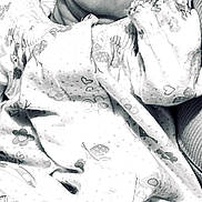 Serenity is registered to the contest to win money with this photo: baby, sleeping, infant, black_and_white, foot, hand, face, closed_eyes, pajamas, patterned_clothing, cute, peaceful, portrait, child, resting, newborn, soft_light, cozy, small_toes, relaxed