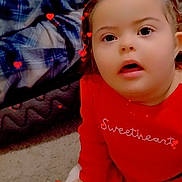 Wynter Faye joined the competition — help win amazing prizes! toddler, child, red_clothing, sitting, carpet, indoor, heart_effects, cute, portrait, baby, face, expression, white_pants, patterned_pants, cozy, floor, person, young_child, playful, warm_colors