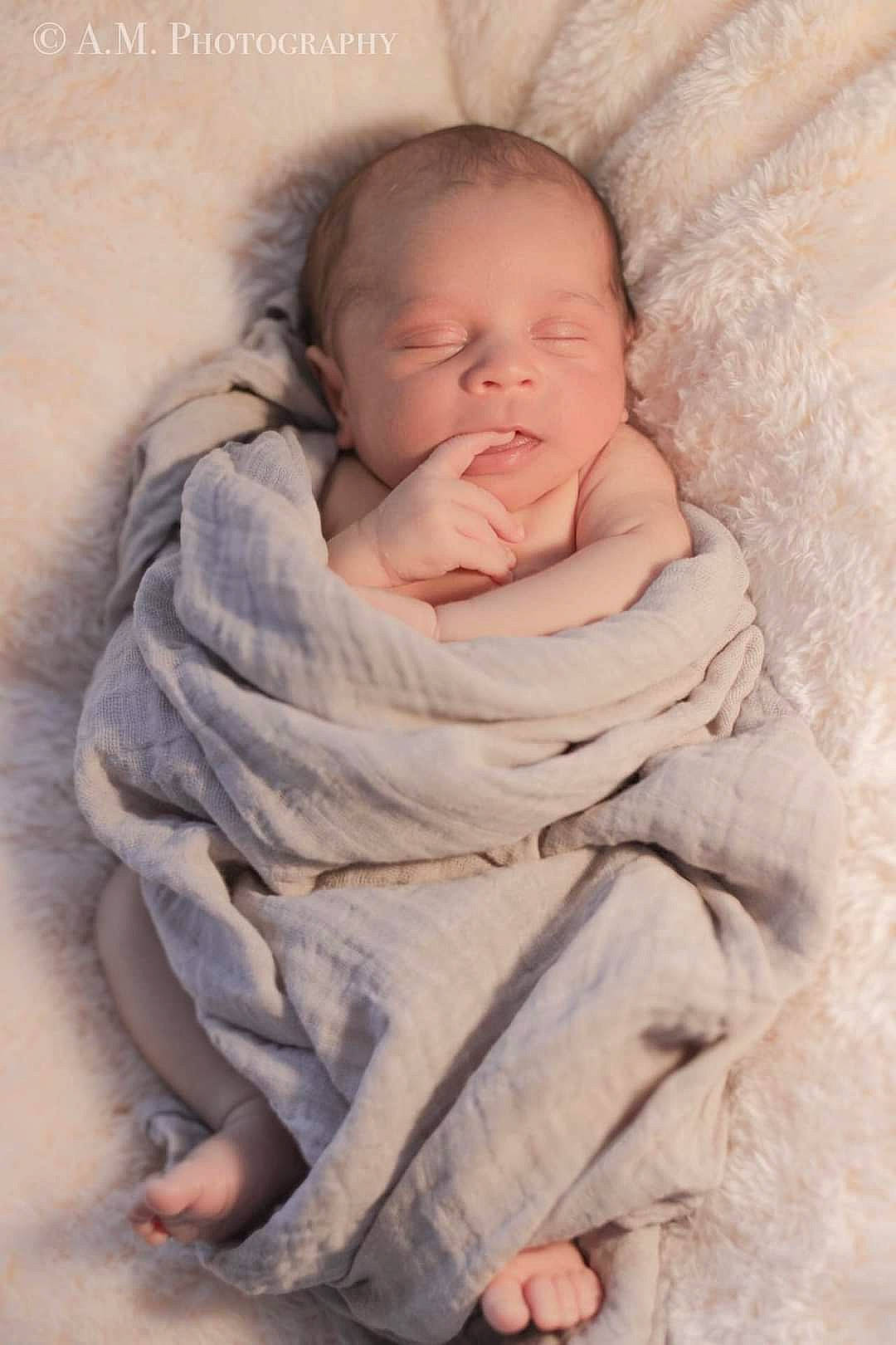 Grayson is registered to the contest to win money with this photo: baby, baby_sleeping, baby_toddler_clothing, bedtime, cheek, child, comfort, face, fur, linens, nap, nose, person, portrait_photography, room, sitting, sleep, sleeve, toddler