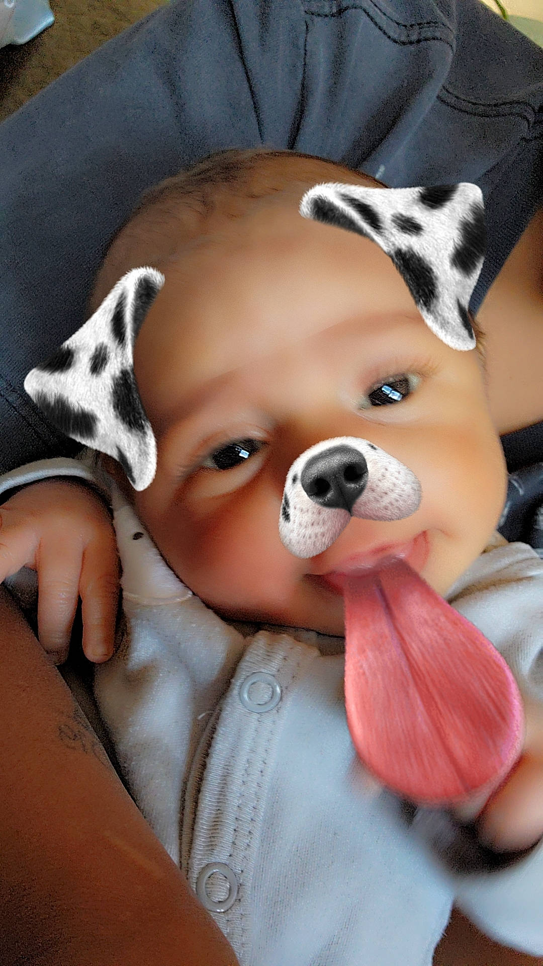 Grayson is registered to the contest to win money with this photo: baby, cheek, child, companion_dog, doll, eye, eyelash, fawn, fun, fur, happy, linens, nose, person, plush, skin, snout, stuffed_toy, teddy_bear, toddler