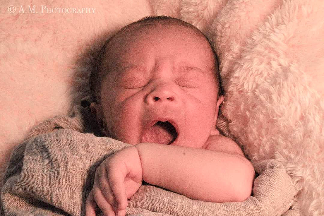 Grayson is registered to the contest to win money with this photo: baby, cheek, comfort, ear, eye, eyebrow, face, finger, flash_photography, gesture, hair, happy, head, human_body, lip, mouth, neck, nose, person, skin