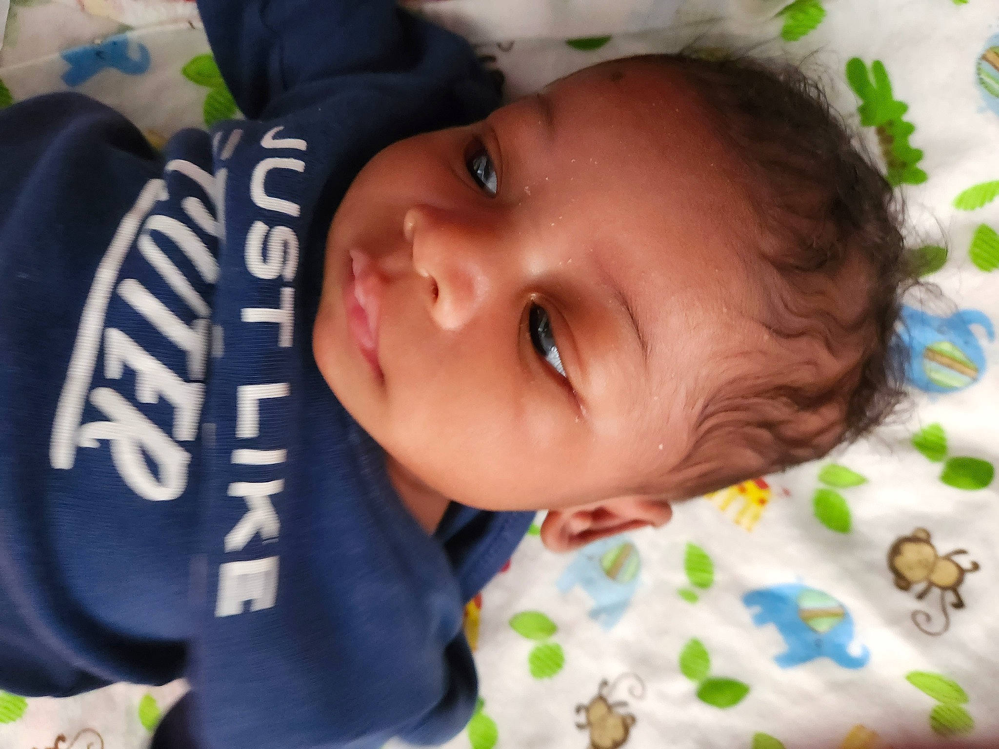 Landon is registered to the contest to win money with this photo: baby, baby_products, baby_toddler_clothing, cheek, child, eyelash, grass, happy, hat, nose, person, plant, smile, toddler, tree