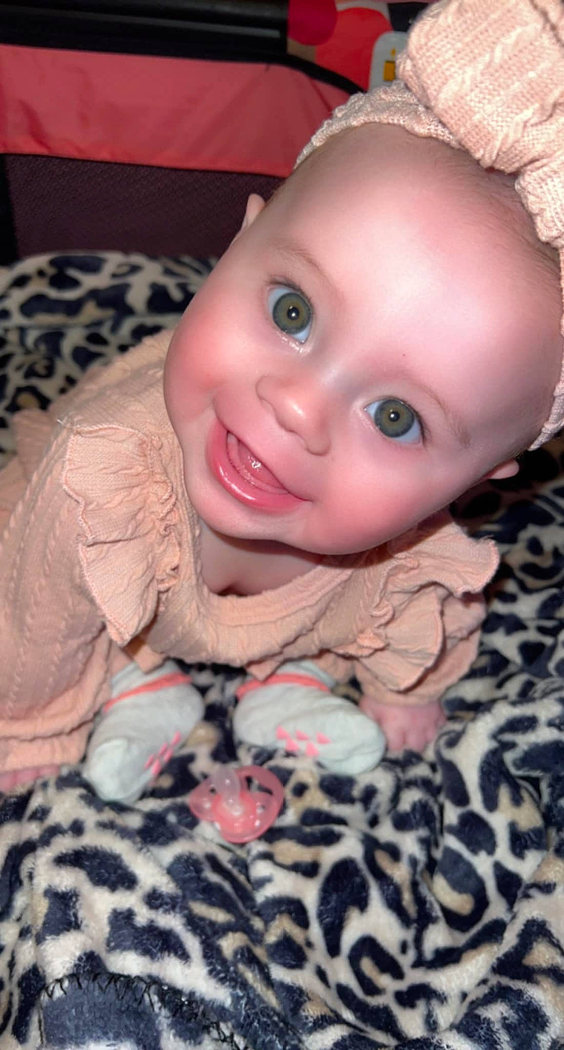 Katalina is registered to the contest to win money with this photo: baby, baby_toddler_clothing, cheek, close_up, comfort, eye, eyebrow, eyelash, finger, happy, human_body, iris, joy, lip, mouth, nose, person, pink, skin, sleeve