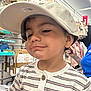 Amelliano joined the competition — help win amazing prizes! child, toddler, boy, striped_shirt, baseball_cap, smile, store, retail, baby_clothes, shelf, shopping, person, indoor, cute, face, clothing, buttoned_shirt, hat, young_child, happy