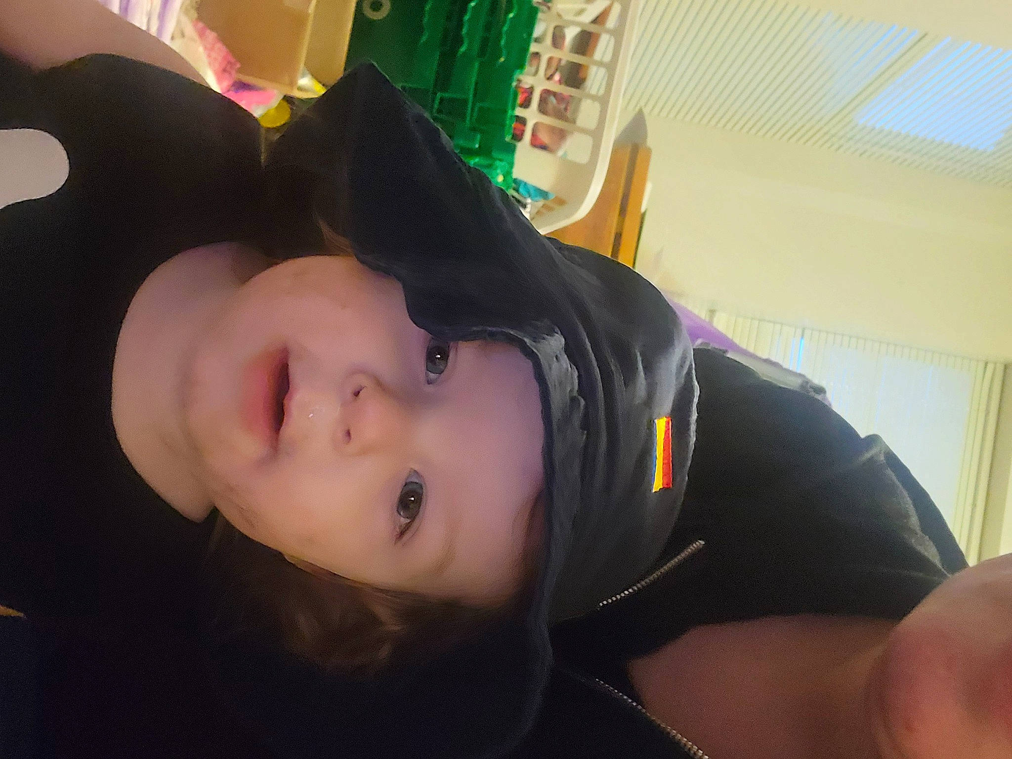 Riftyn is registered to the contest to win money with this photo: audio_equipment, black_hair, child, eyelash, fashion_accessory, fun, hat, headwear, helmet, jaw, lip, mouth, neck, person, personal_protective_equipment, room, selfie, skin, smile, thigh