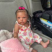 Everleigh joined the competition — help win amazing prizes! accessories, baby, bodypart, car, car_interior, clothing, couch, cushion, dress, face, finger, furniture, hand, head, homedecor, person, photography, portrait, sitting, sunglasses