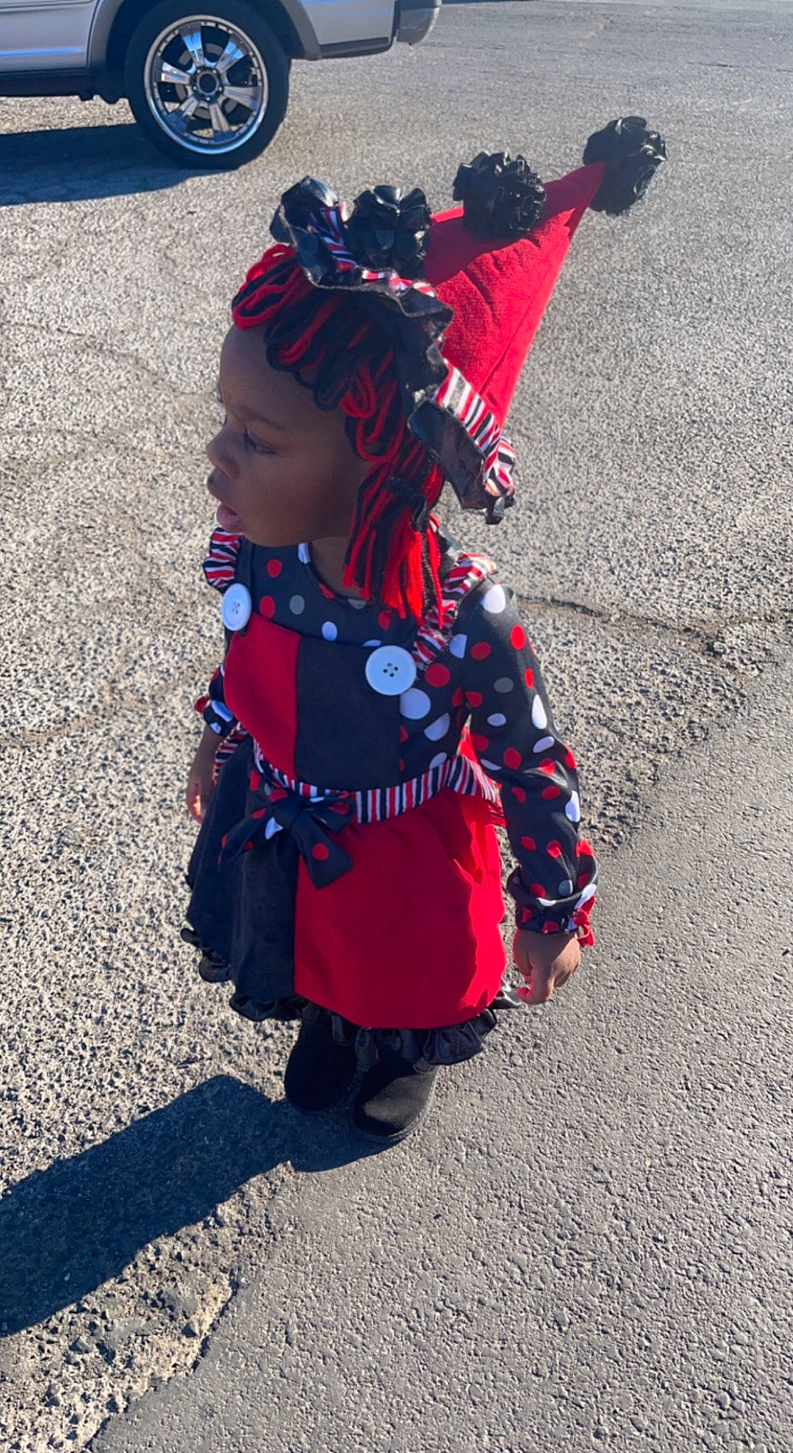 Mirakole joined the competition — help win amazing prizes! asphalt, blue, child, costume, costume_hat, dress, electric_blue, event, fashion_accessory, happy, hat, magenta, pattern, person, road_surface, shadow, tar, tire, toddler, tradition