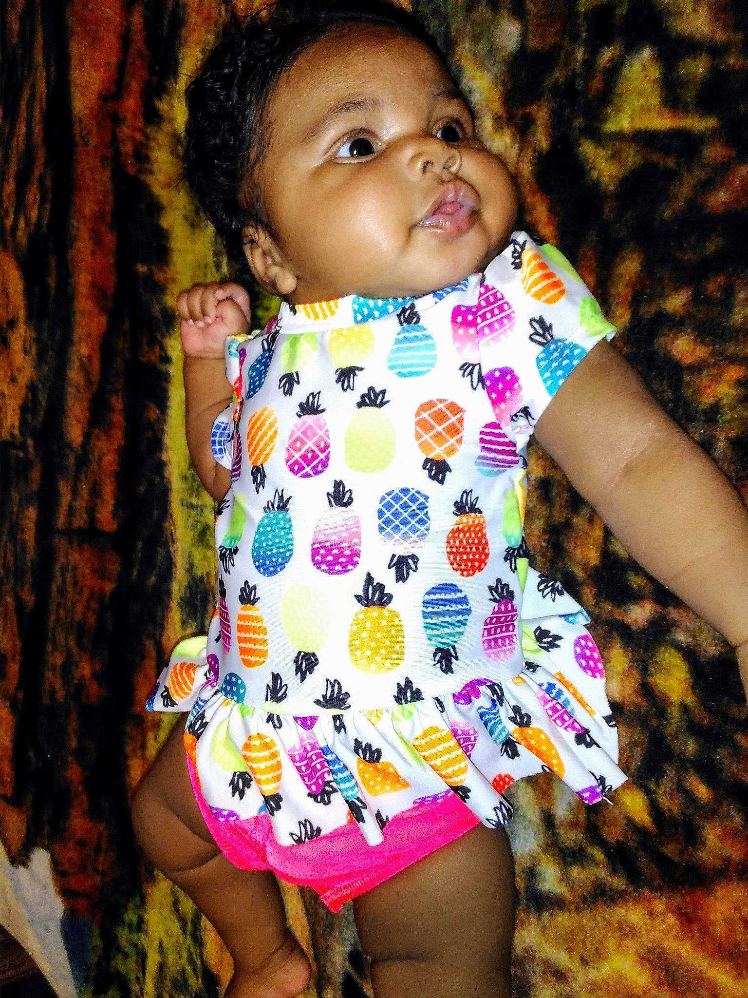 Madeleina is registered to the contest to win money with this photo: baby_toddler_clothing, child, child_model, pattern, person, pink, toddler