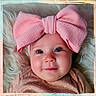 baby, infant, pink_bow, headwear, face, blue_eyes, smile, polka_dot_clothing, soft_texture, fluffy_background, portrait, cute, child, closeup, adorable, happy, baby_girl, newborn, soft_lighting, pastel_colors