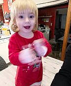 Marion participe au concours pour gagner de l'argent avec cette photo : baby, building, chair, cheek, child, facial_expression, flooring, fun, furniture, hairstyle, hat, house, mouth, nose, person, play, sleeve, smile, table, toddler