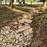 adventure, boulders, child, climbing, creek, exploring, face, grass, landscape, nature, outdoor, park, pink_shirt, playground, portrait, rocks, rocky_streambed, sunlight, toddler, trees