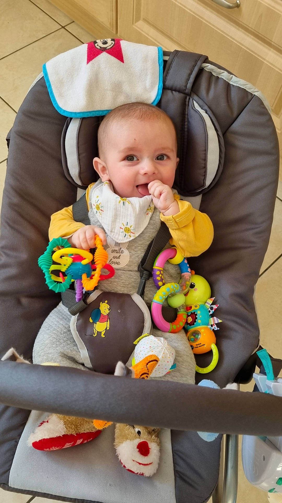 Eden participe au concours pour gagner de l'argent avec cette photo : arm, baby, baby_products, baby_toddler_clothing, chair, cheek, comfort, eye, face, head, human_body, lap, leg, organ, people, person, purple, skin, stuffed_toy, toddler