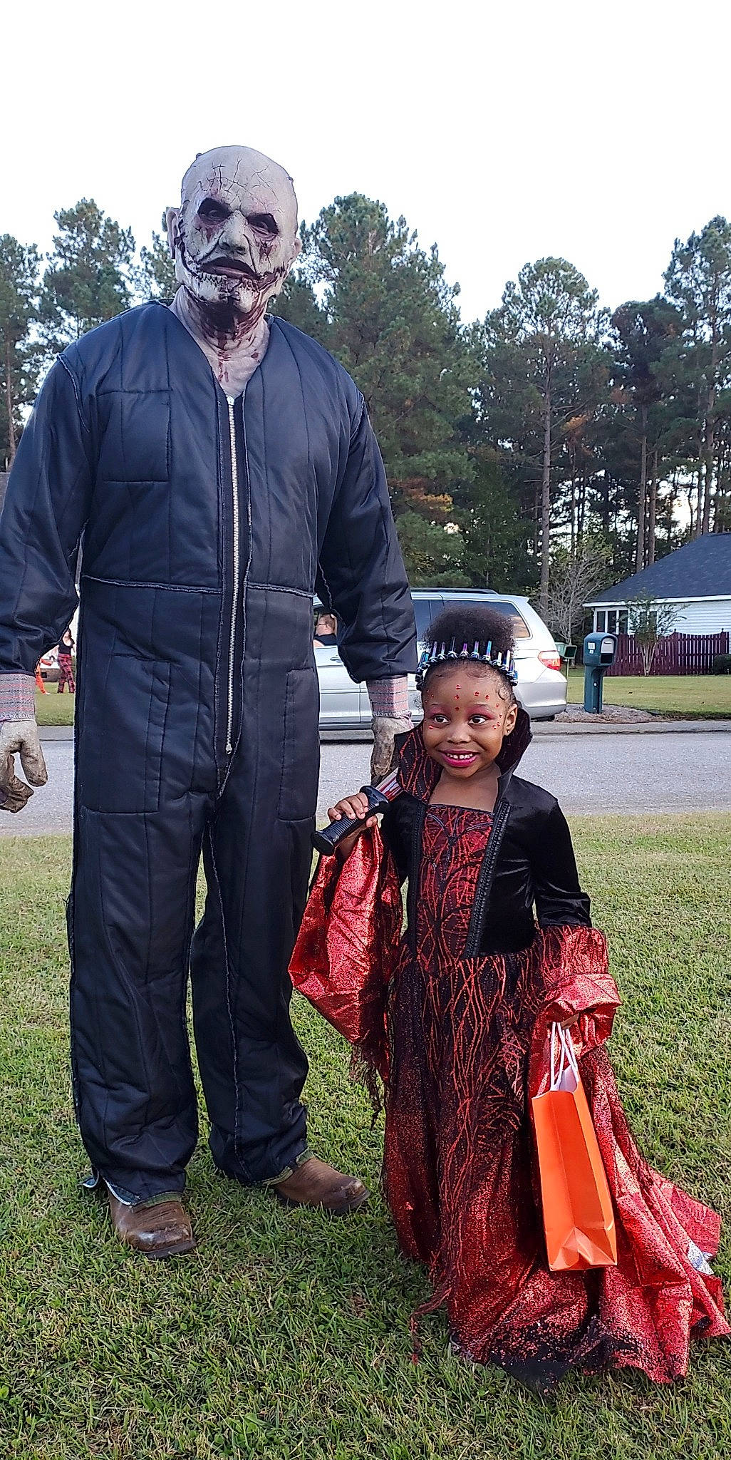 Aubri  joined the competition — help win amazing prizes! beard, car, costume, event, eyewear, fashion, formal_wear, fun, grass, hairstyle, human, joy, outerwear, people_in_nature, person, sky, sleeve, standing, toddler, tradition