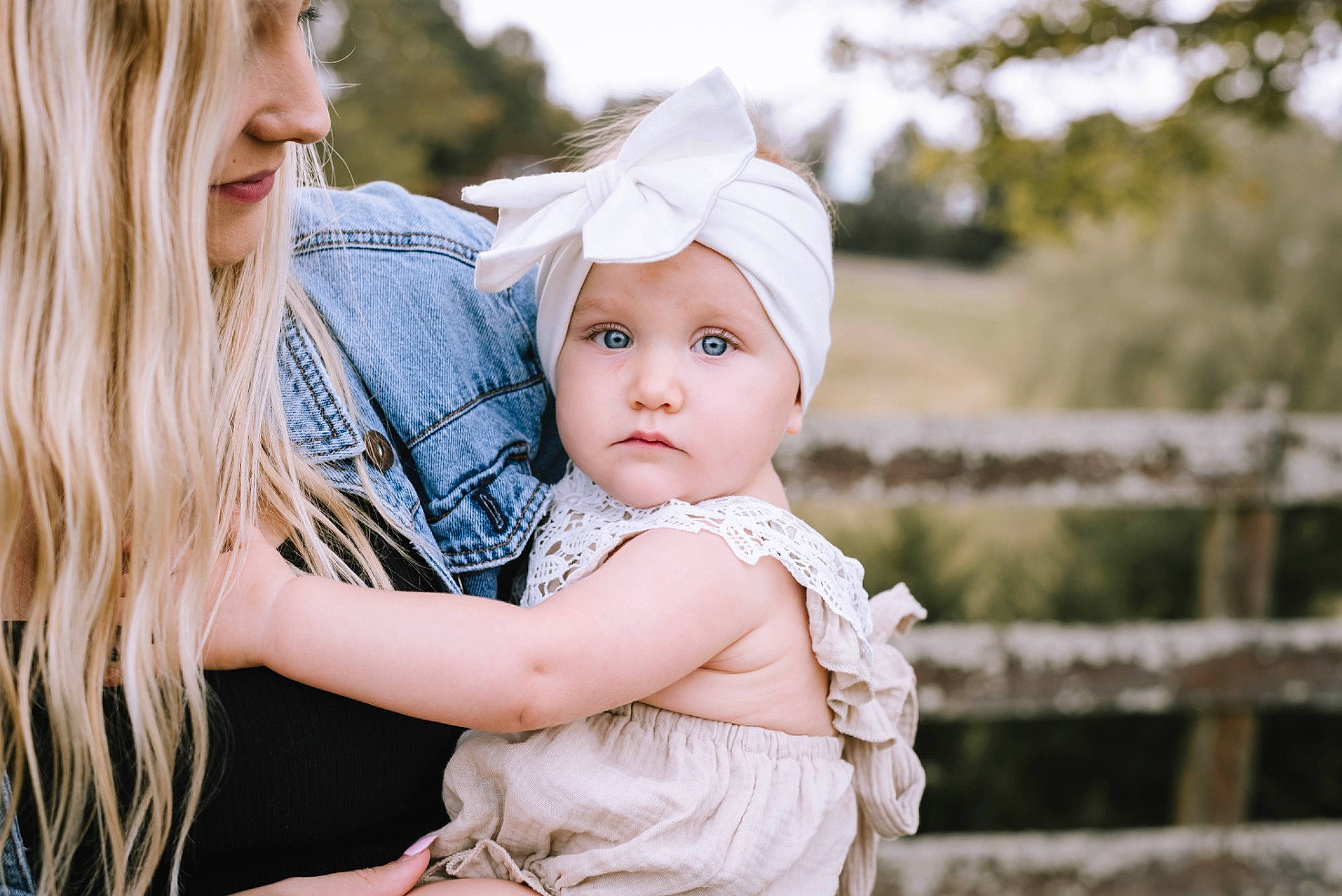 Oaklyn joined the competition — help win amazing prizes! baby, blond, child, dress, eye, face, flash_photography, fun, gesture, grass, happy, head, headwear, love, pattern, people_in_nature, person, plant, sitting, skin