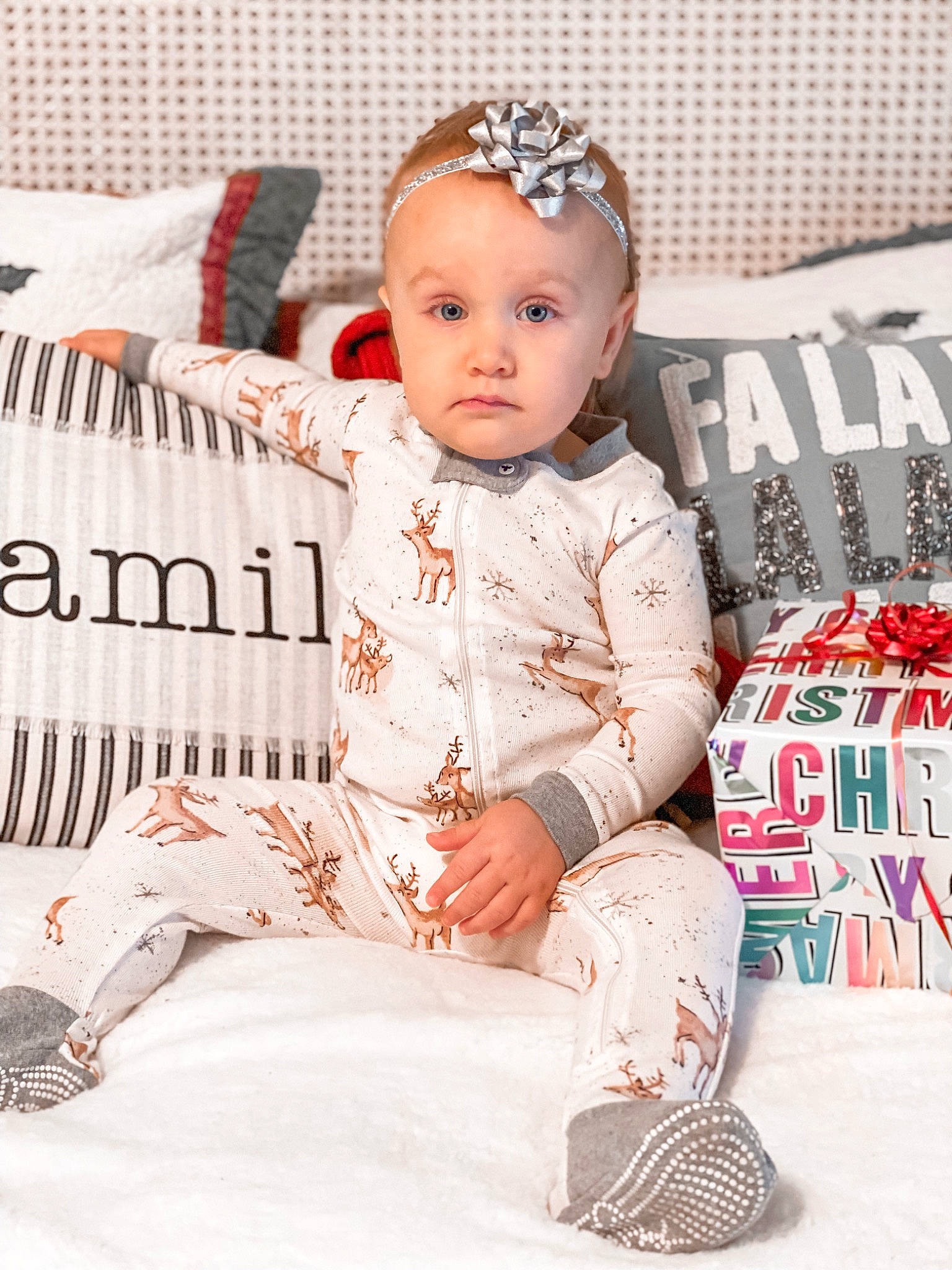 Oaklyn joined the competition — help win amazing prizes! baby, baby_toddler_clothing, carmine, child, christmas, costume_hat, event, eye, fashion_accessory, fashion_design, happy, headband, pattern, person, pink, sitting, sleeve, sneakers, textile, toddler