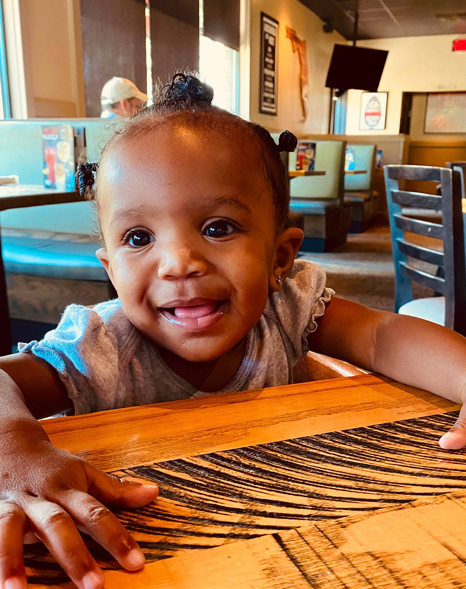 Serenity joined the competition — help win amazing prizes! chair, child, eyelash, finger, floor, flooring, fun, happy, hardwood, joy, musical_instrument, nail, pattern, person, sitting, skin, smile, snapshot, table, thumb