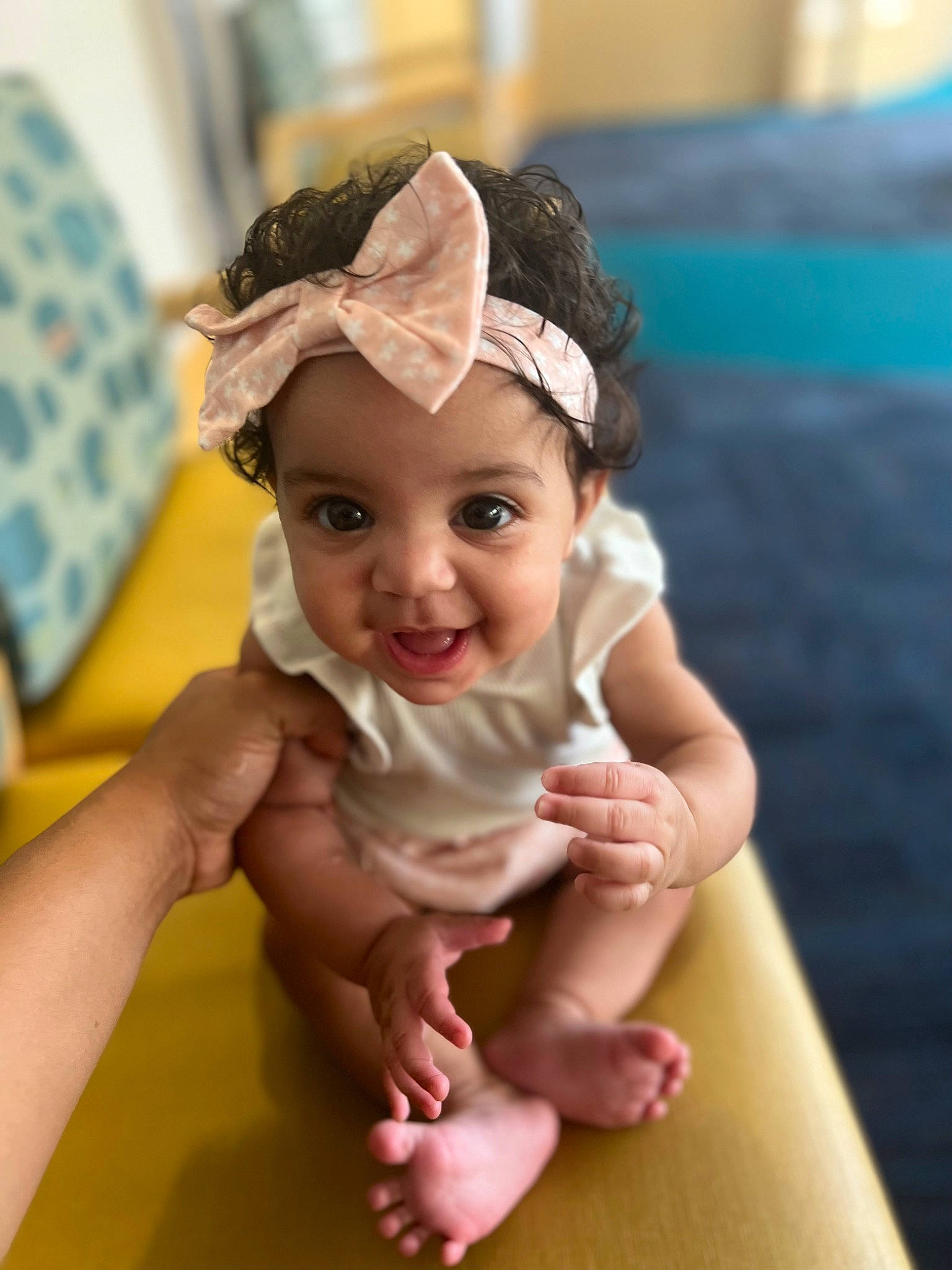 Khloe joined the competition — help win amazing prizes! baby, baby_toddler_clothing, cheek, child, chin, dress, eye, fashion_accessory, finger, foot, fun, gesture, hair_accessory, hand, happy, headband, headpiece, headwear, person, smile