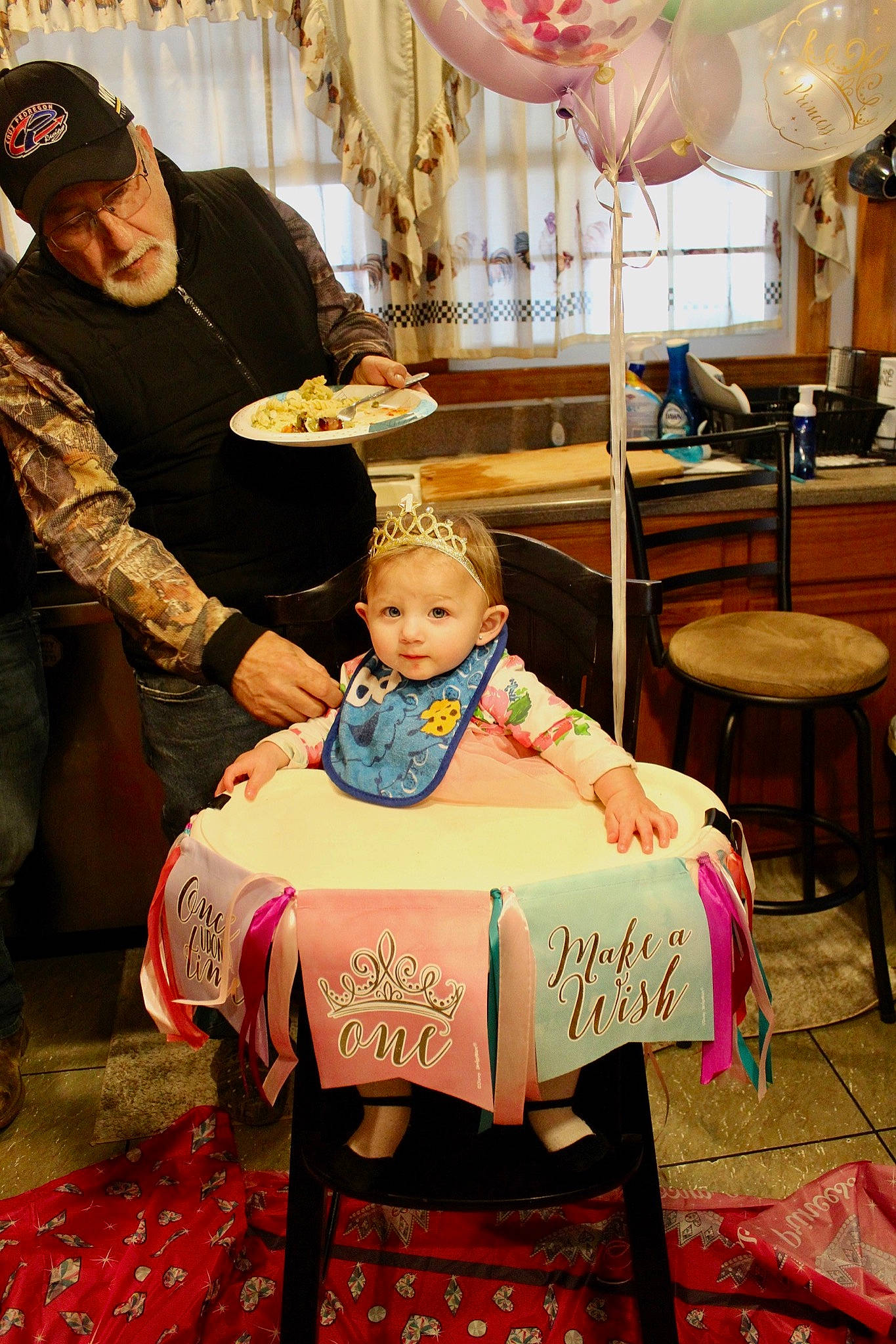 Angelica joined the competition — help win amazing prizes! baby, baby_toddler_clothing, baseball_cap, cap, chair, child, curtain, dress, event, fashion, flooring, fun, furniture, hat, headwear, lap, person, room, sitting, table