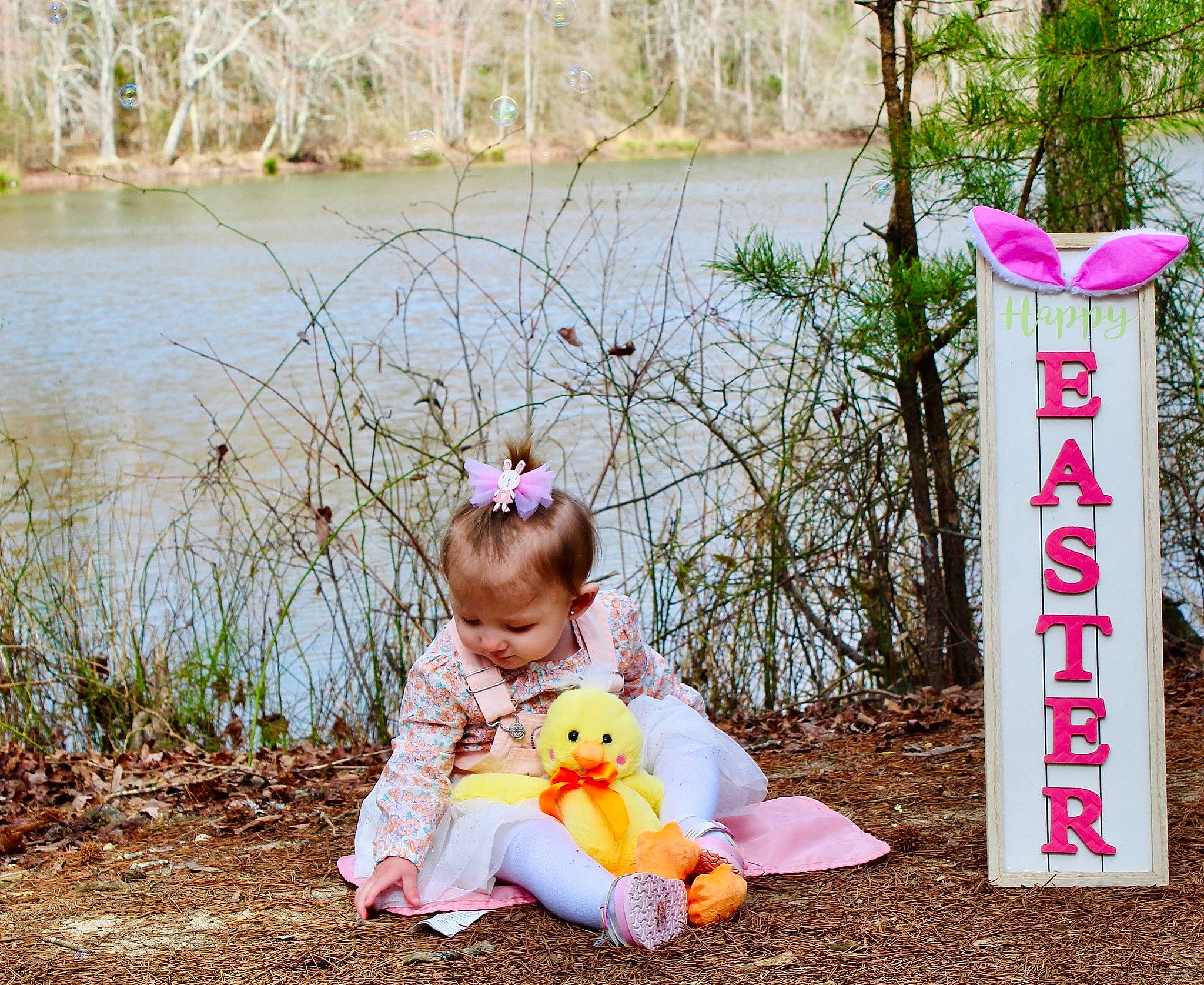 Angelica joined the competition — help win amazing prizes! baby, botany, child, grass, green, happy, hat, lake, leisure, nature, people_in_nature, person, pink, plant, recreation, spring, teddy_bear, toddler, toy, tree