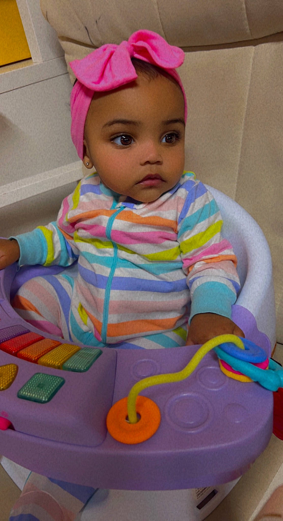 Mariah is registered to the contest to win money with this photo: baby, baby_playing_with_toys, baby_products, baby_toddler_clothing, cap, cheek, child, fun, happy, head, magenta, person, pink, play, product, purple, sitting, skin, snapshot, toddler