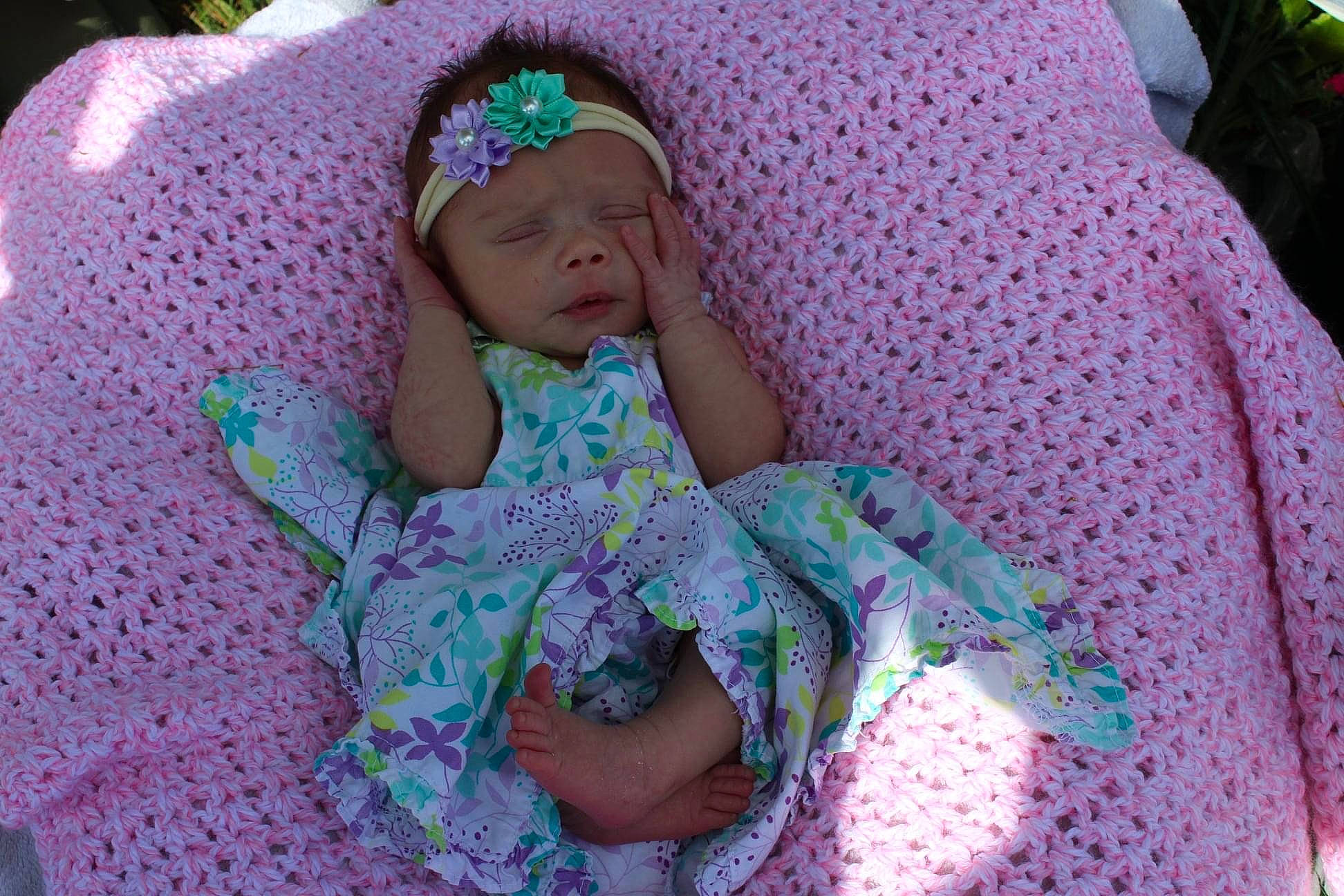 Bella joined the competition — help win amazing prizes! baby, baby_products, bedtime, child, crochet, headgear, headwear, knitting, person, pink, purple, textile, toddler