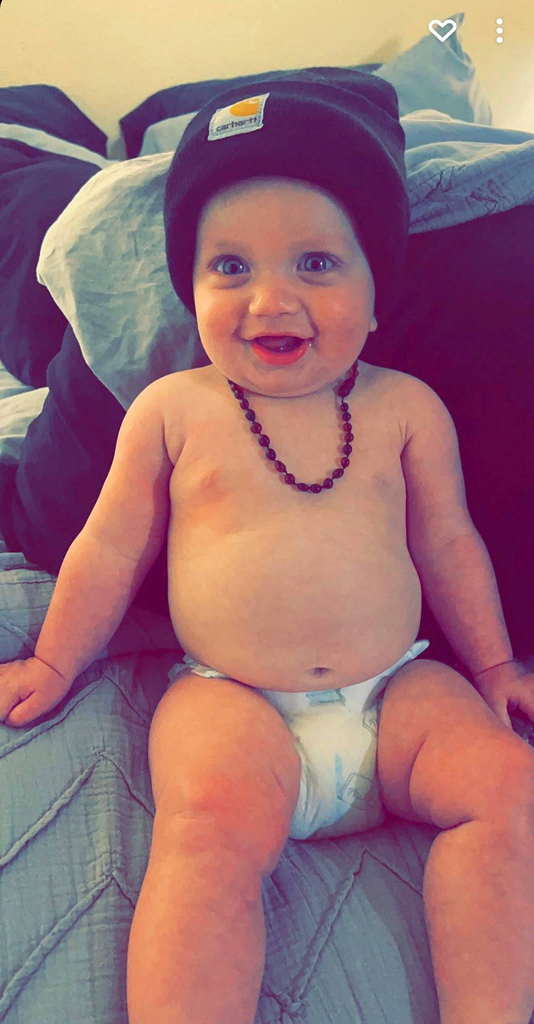 Bentley is registered to the contest to win money with this photo: baby, baseball_cap, cap, cool, face, facial_expression, finger, happy, hat, head, headwear, human, human_body, joy, mouth, muscle, organ, person, photograph, skin