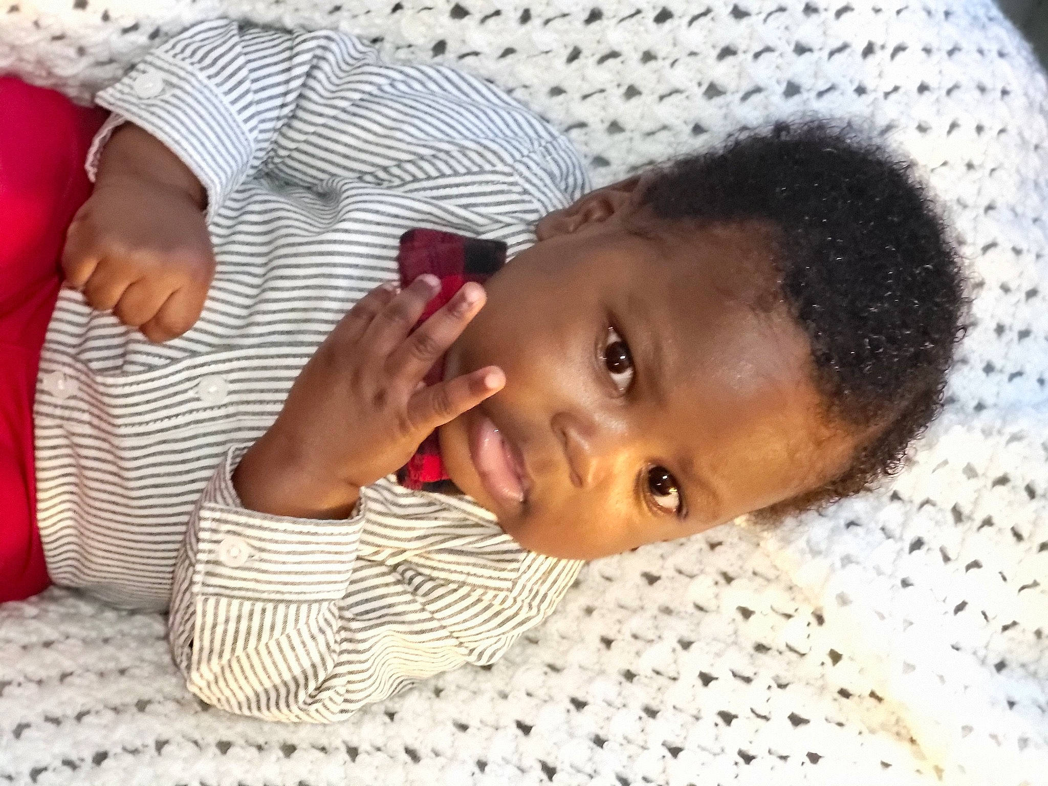 Marck Messiah is registered to the contest to win money with this photo: adaptation, baby, baby_toddler_clothing, child, comfort, fun, happy, head, lip, mouth, nail, nose, pattern, person, skin, thumb, toddler