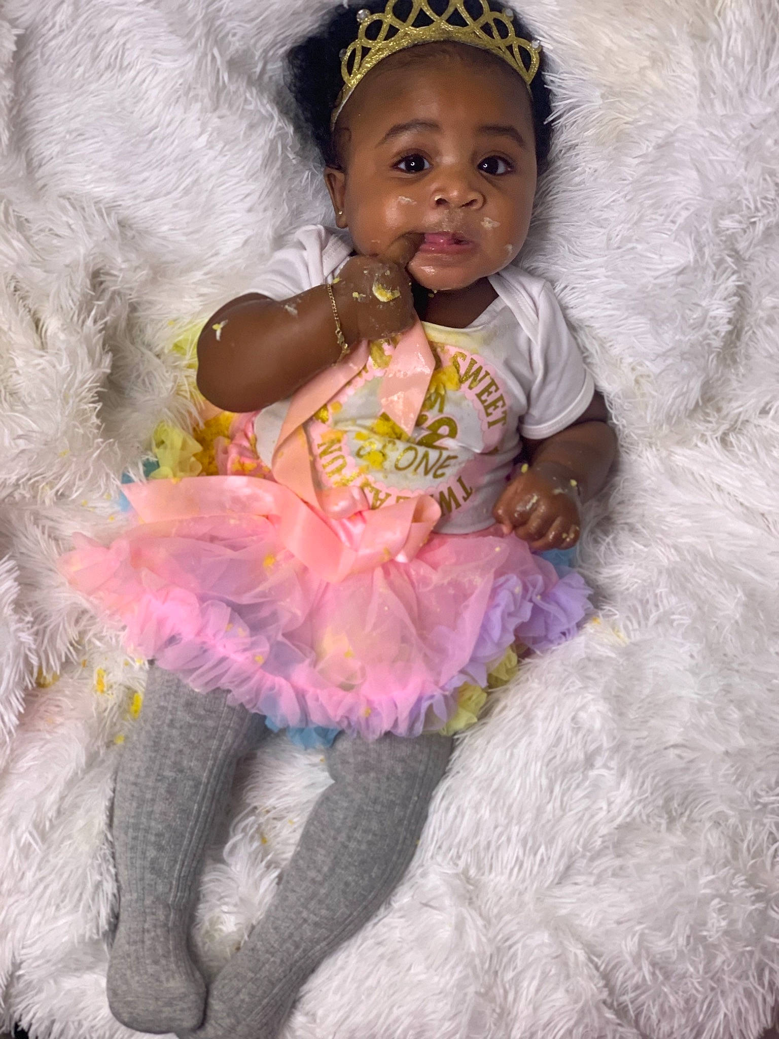 Lailani is registered to the contest to win money with this photo: baby, baby_toddler_clothing, ballet_tutu, child, clothing, costume, costume_accessory, doll, dress, hair_accessory, headgear, person, pink, product, smile, toddler, toy